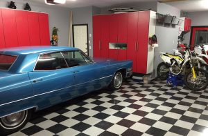 blue vehicle in custom garage