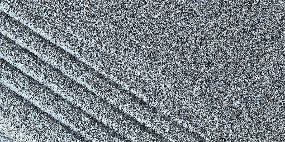 Polyaspartic vs Epoxy garage floor with decorative flakes in Calgary home